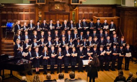 RGS Worcester choir performing in Perrins Hall