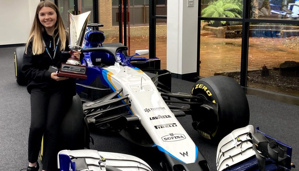 SQ Amy with George Russell’s 2nd place trophy from the 2021 Belgian Grand Prix copy