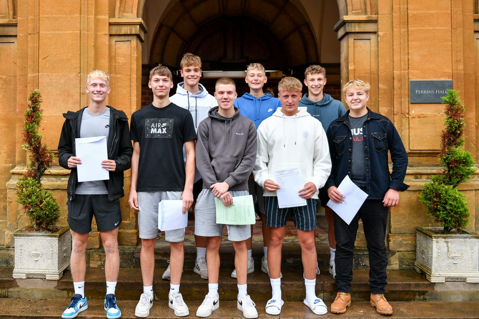 RGS Worcester Sixth Form students outside Perrins Hall on Exam Results Day