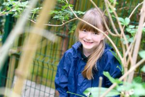 RGS Dodderhill Nursery in Droitwich, child outside