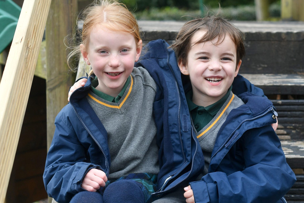 RGS Dodderhill pupils sat on step outside